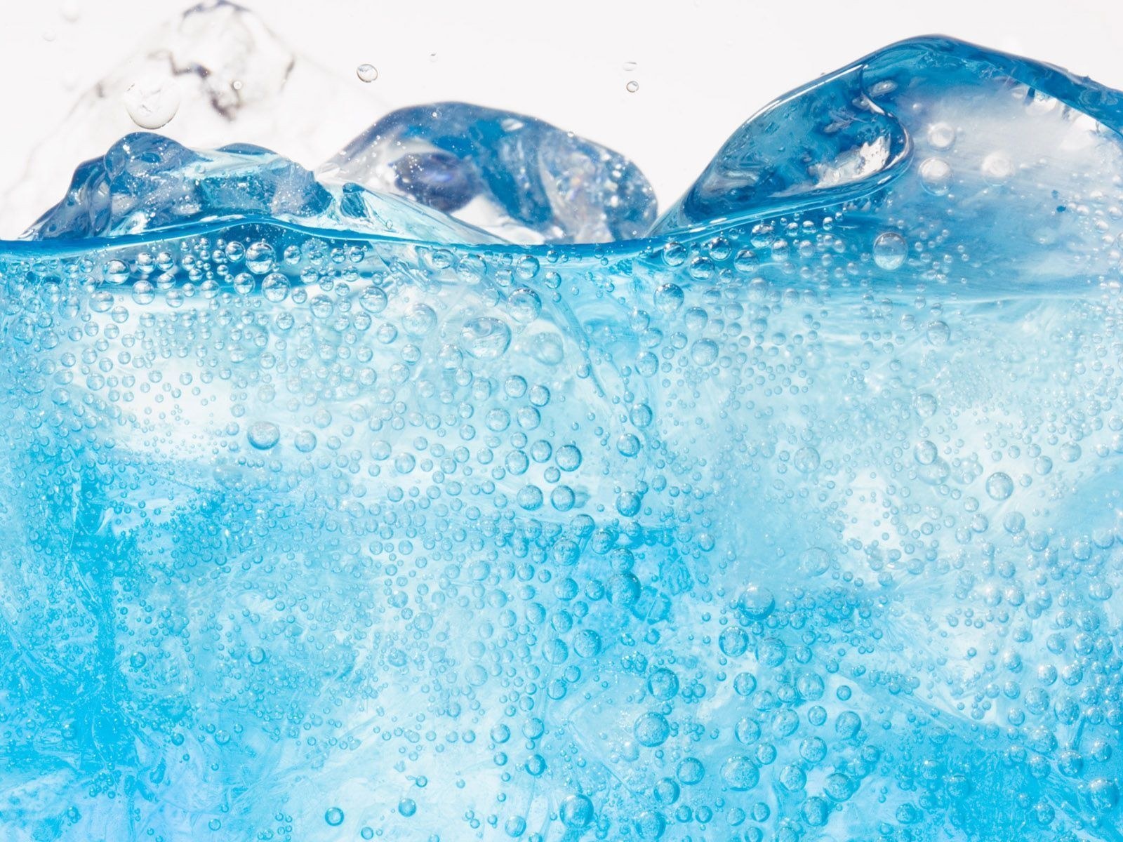 Blue water with ice cubes