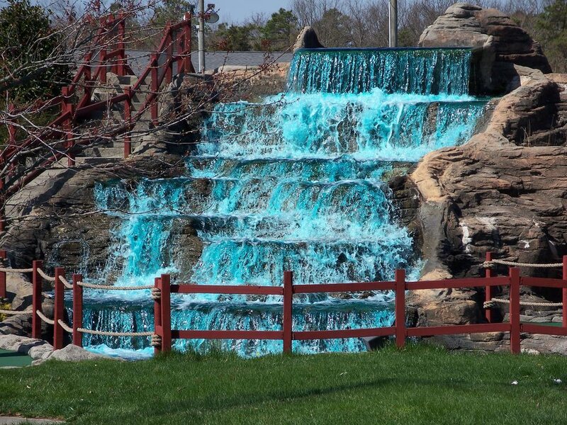 Blue waterfall at mini golf course