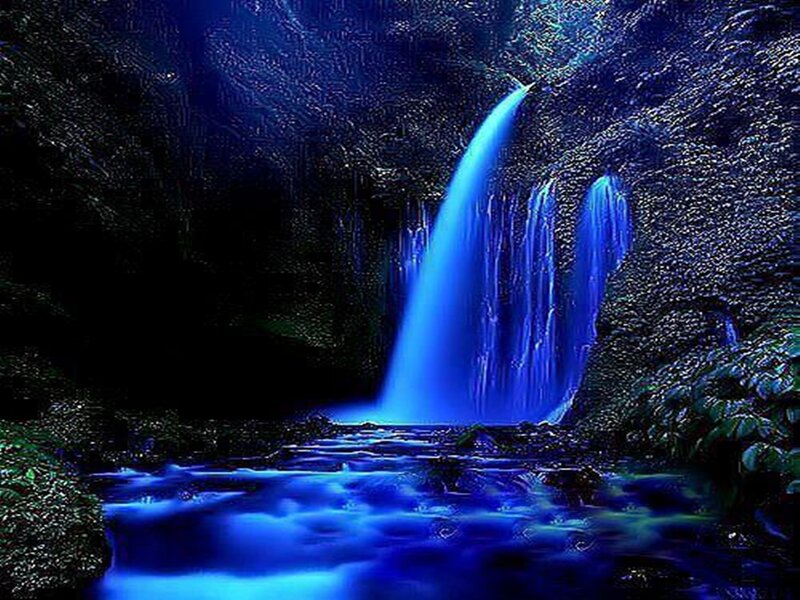 Blue Waterfall in Cave — Dramatic