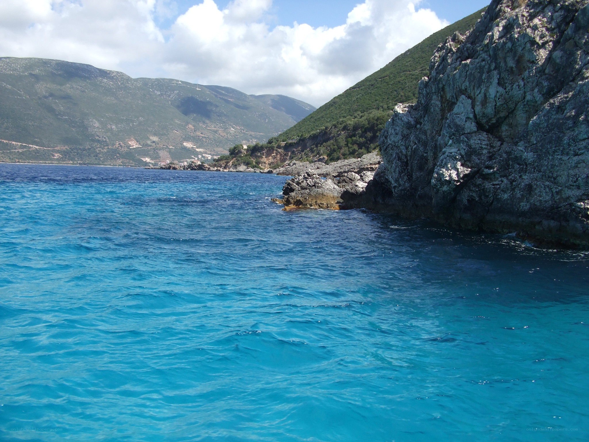 Blue waters along rocky coast