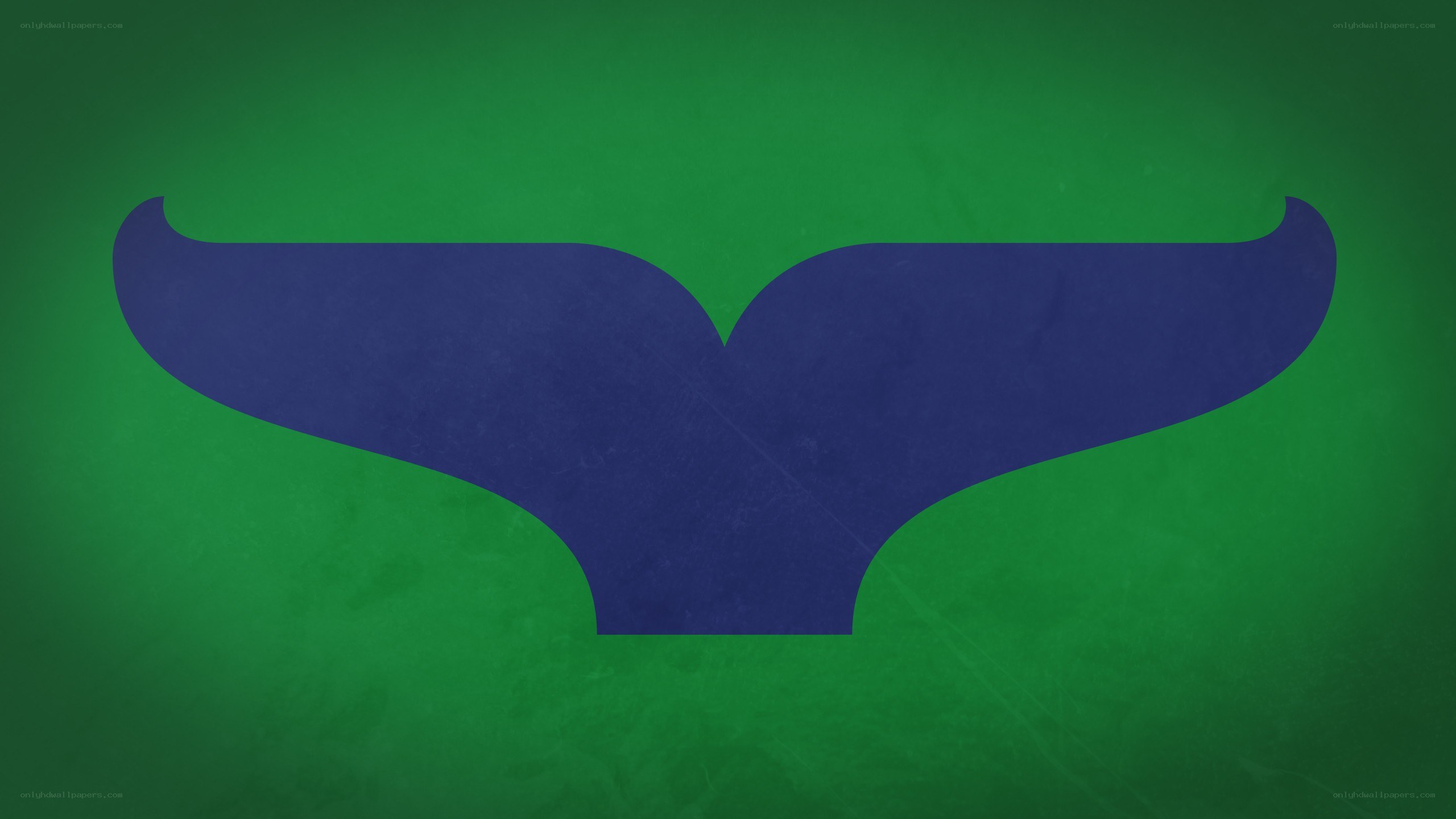 blue whale tail on green
