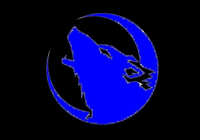 blue wolf howling at moon