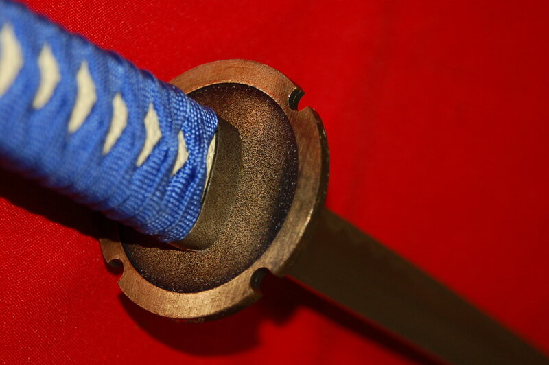 Blue-wrapped sword hilt