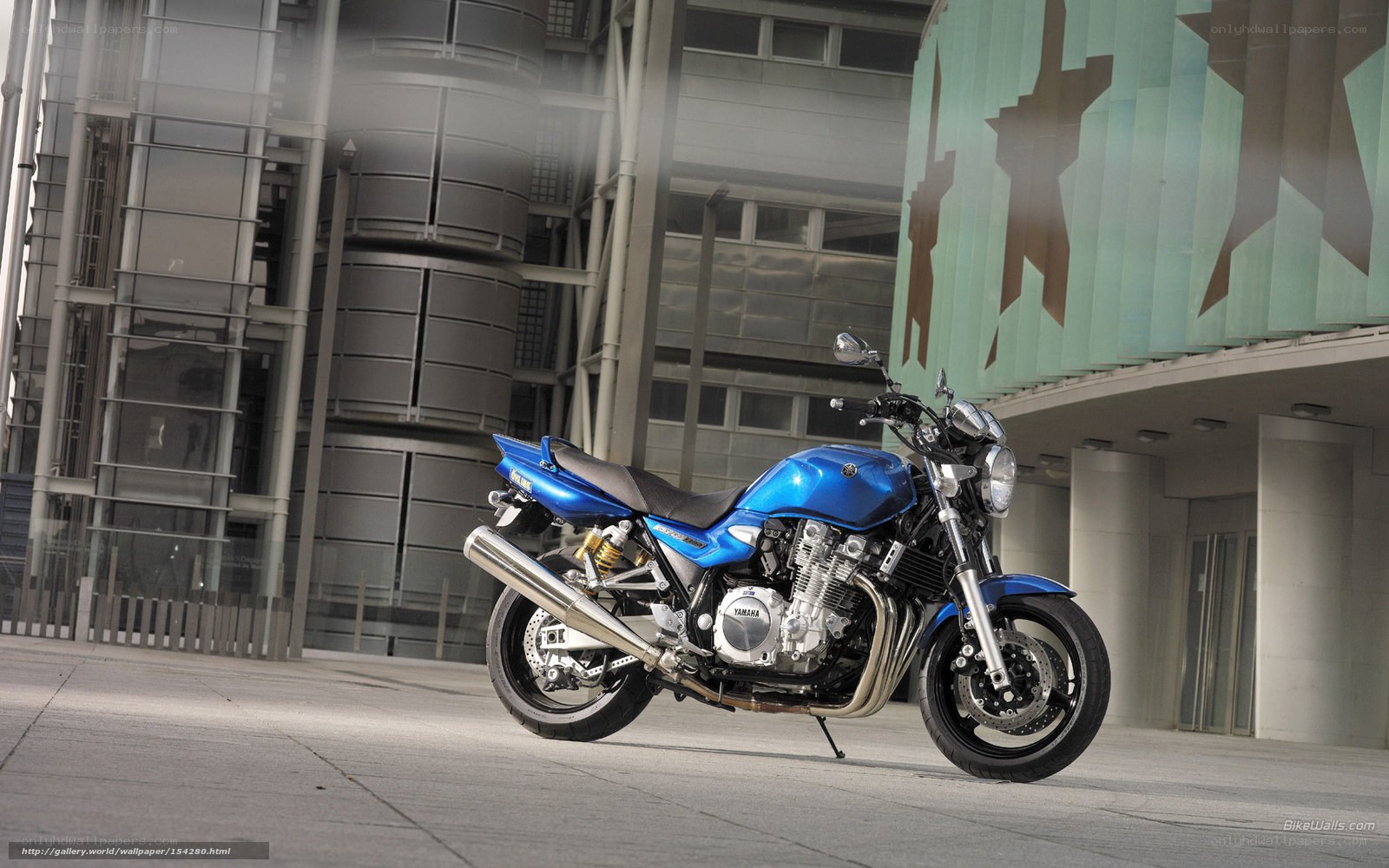 Blue Yamaha motorcycle in city