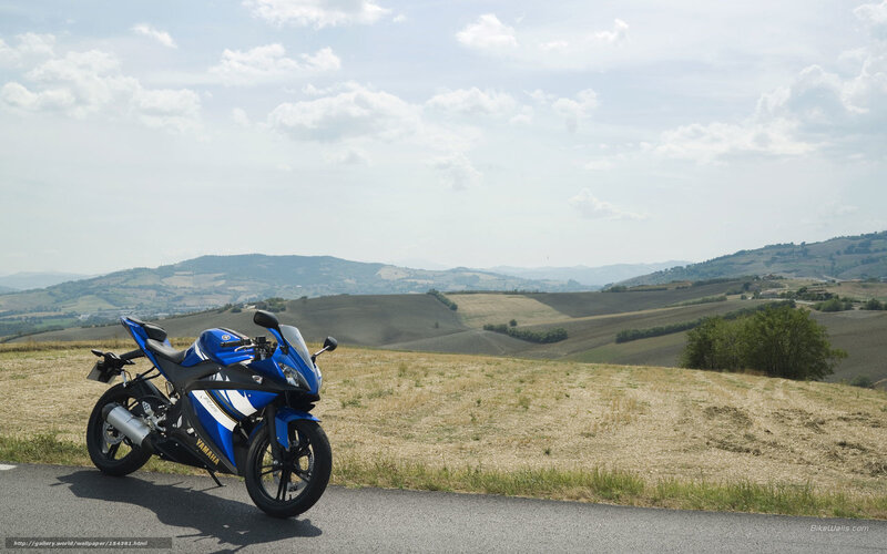 Blue Yamaha motorcycle on a country road