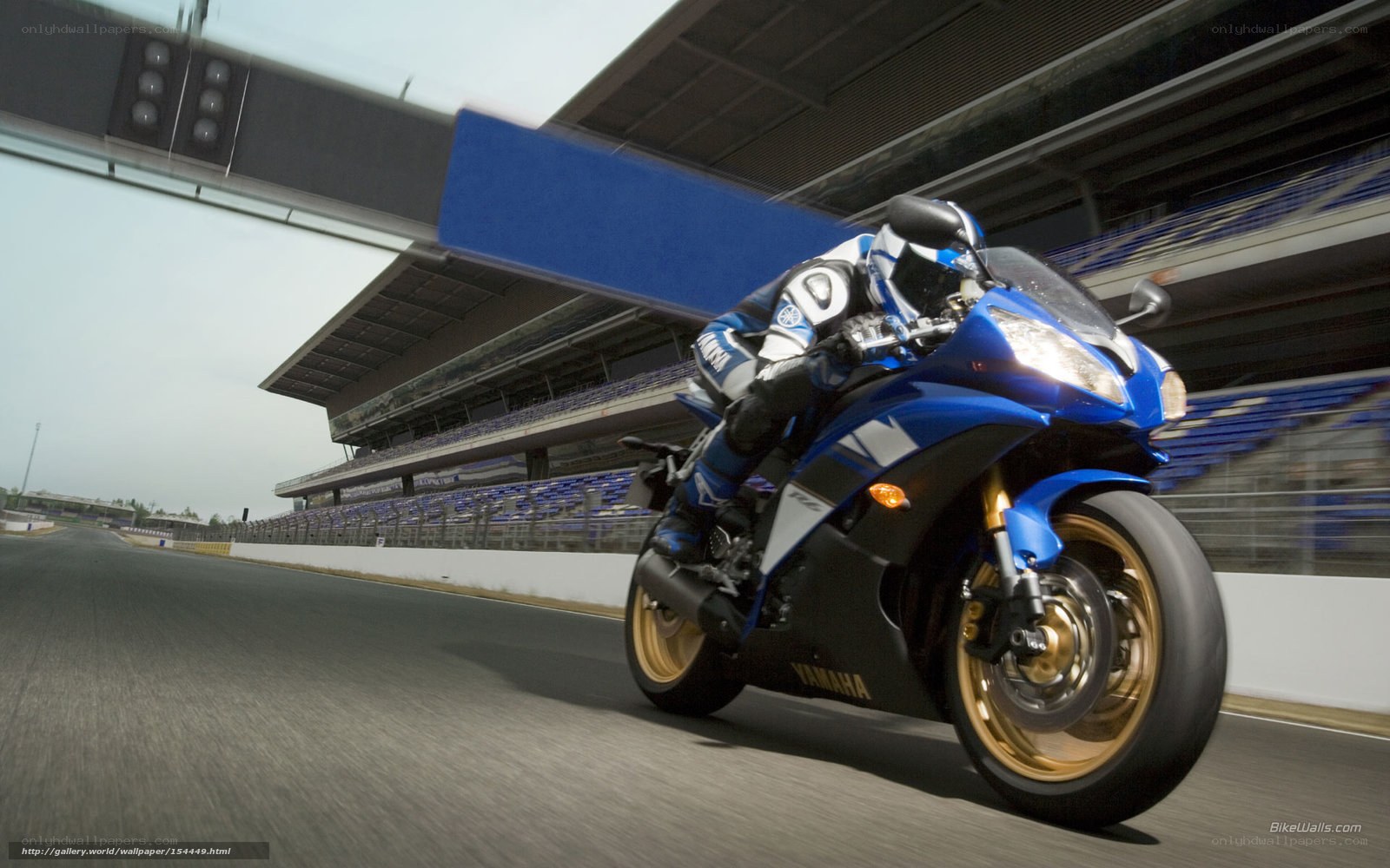 Blue Yamaha motorcycle on racetrack