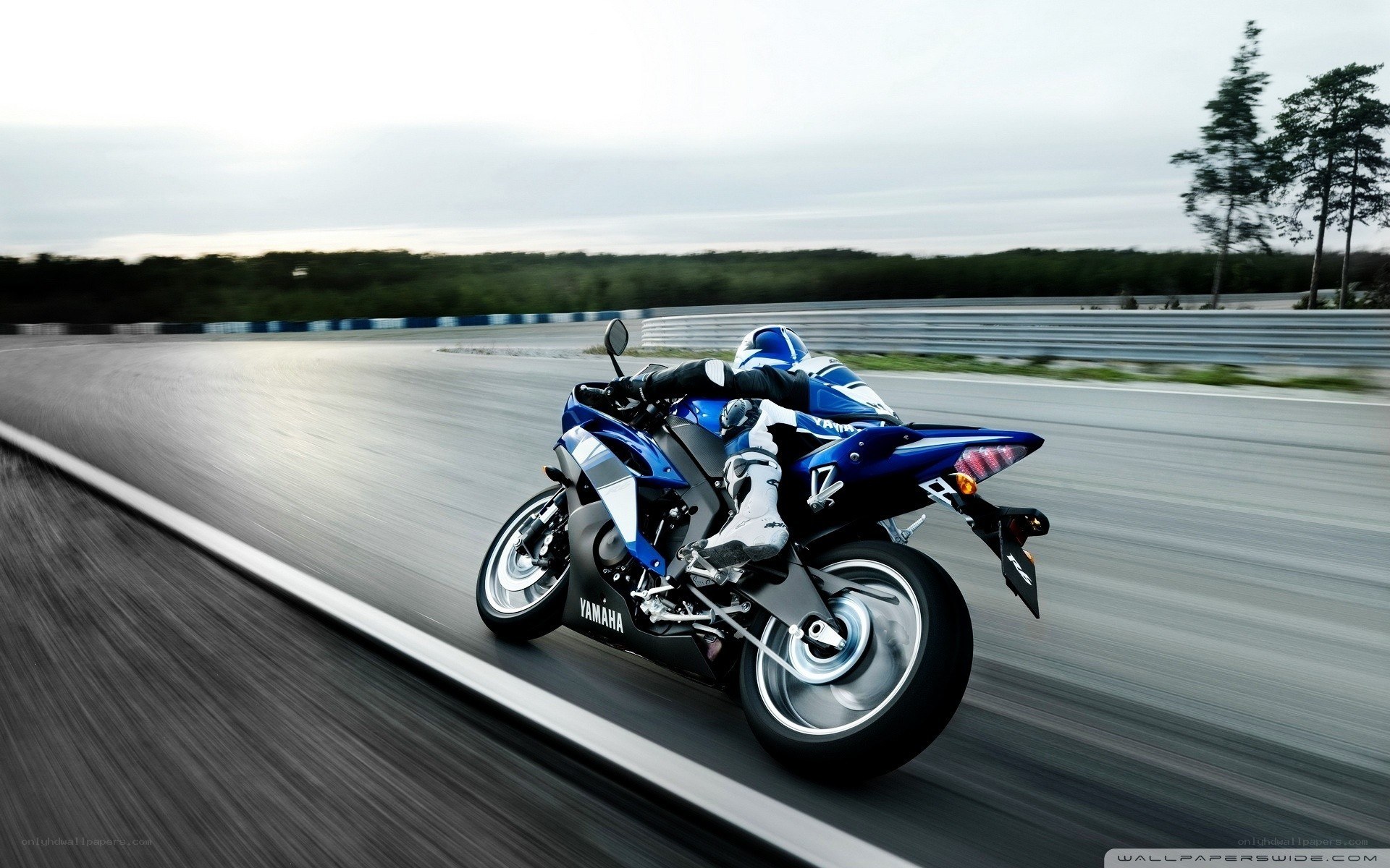 Blue Yamaha motorcycle on track