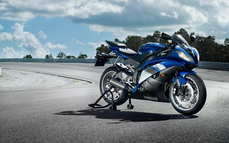 Blue Yamaha sportbike on racetrack