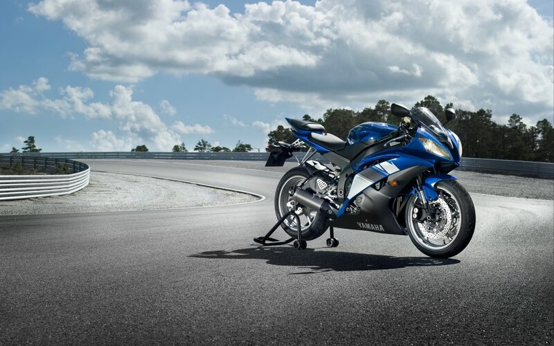 Blue Yamaha sportbike on racetrack