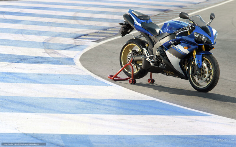 Blue Yamaha sportbike on track