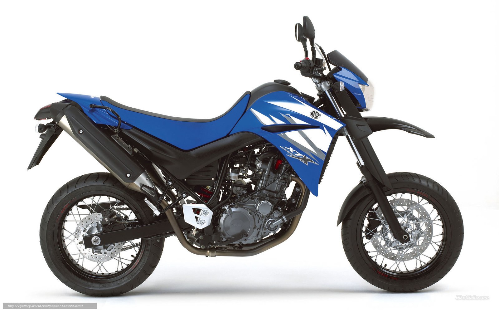 blue yamaha xtz motorcycle