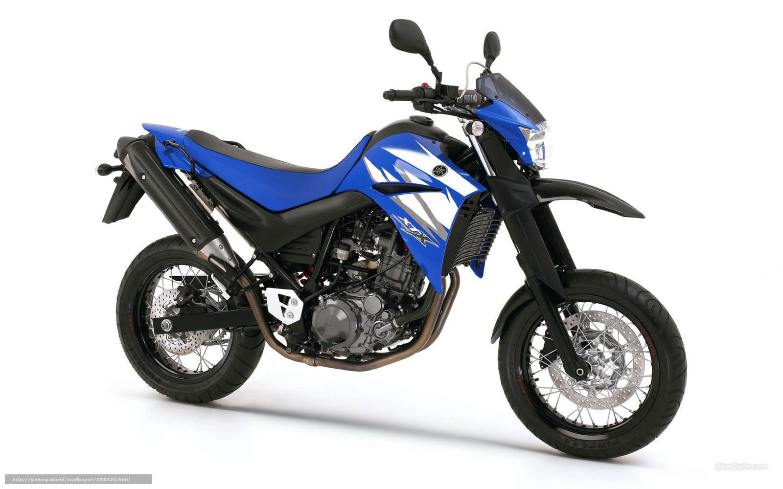blue yamaha xtz motorcycle