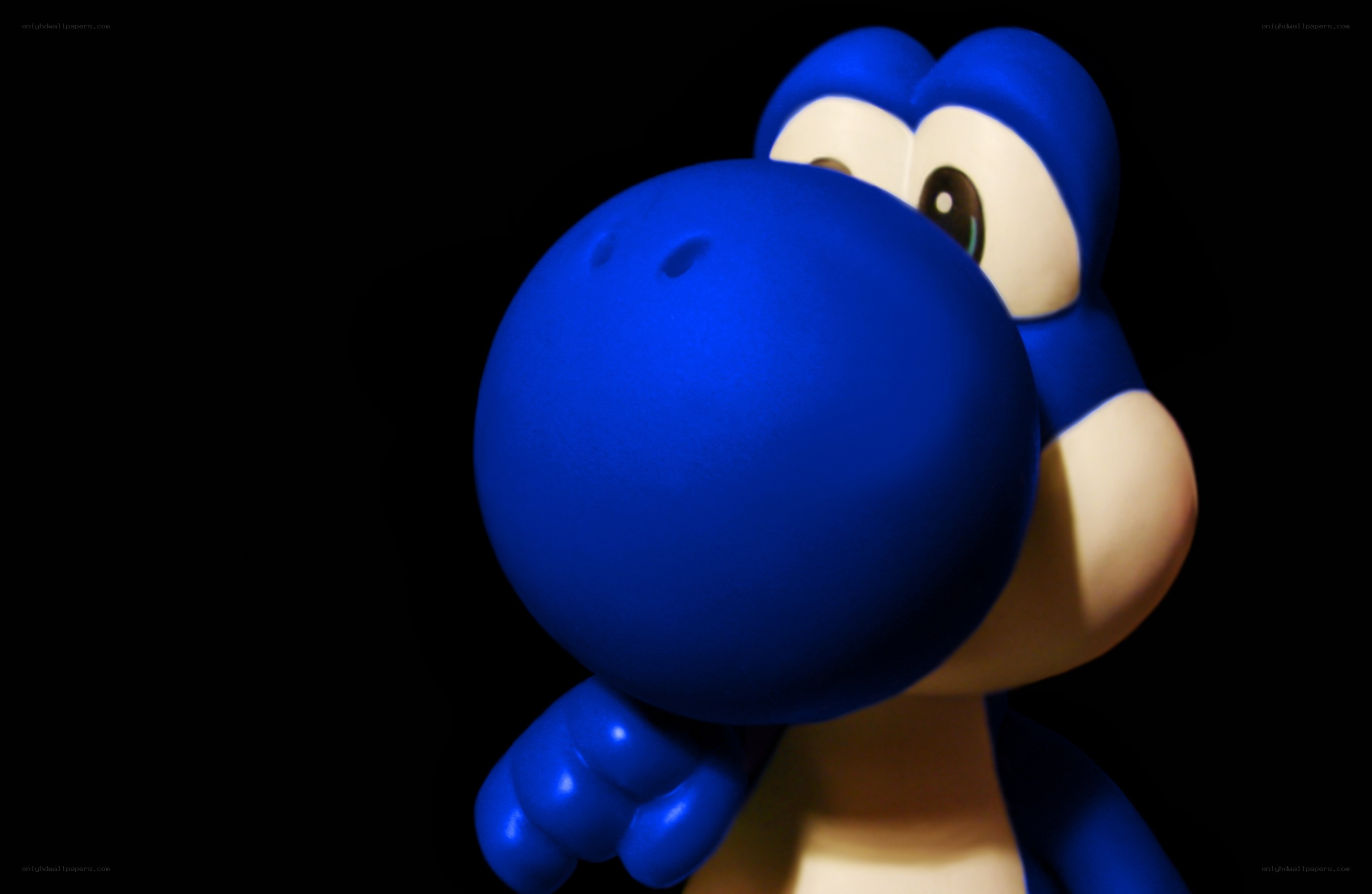 Blue Yoshi figurine close-up