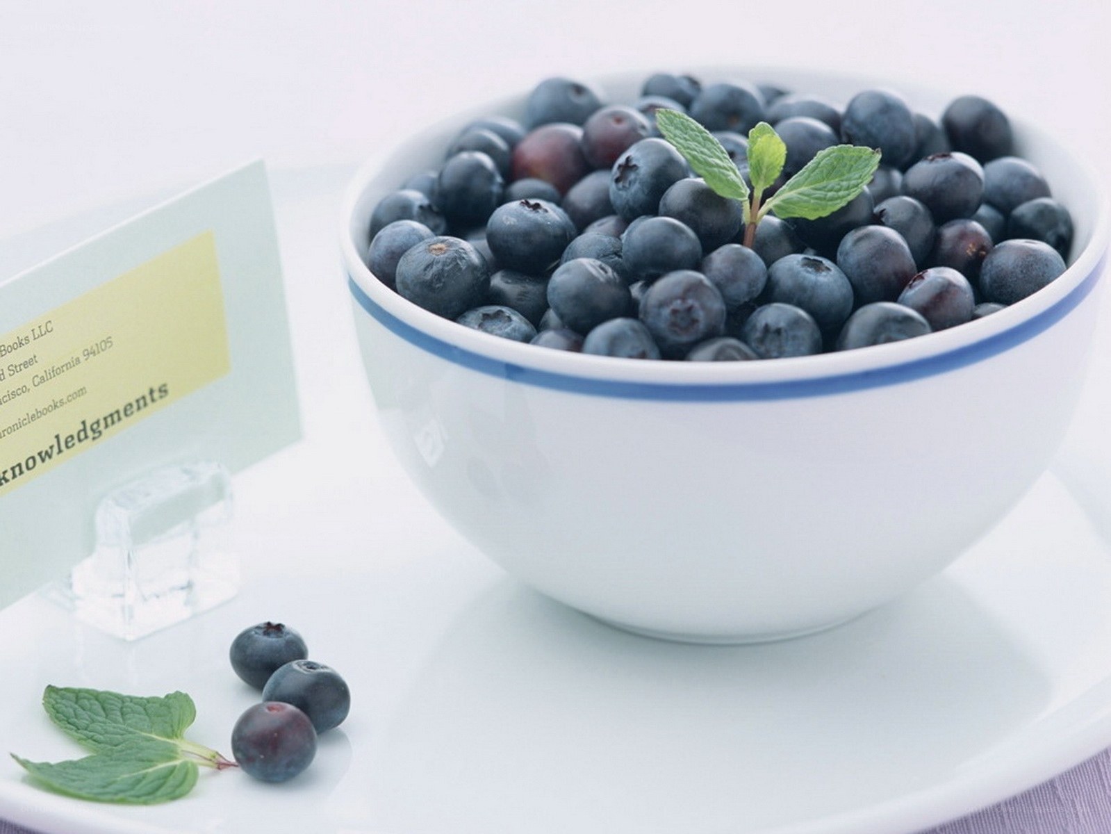 Blueberries in a bowl with mint