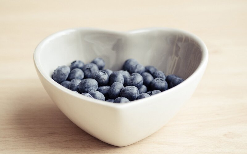 blueberries in a heart-shaped bowl