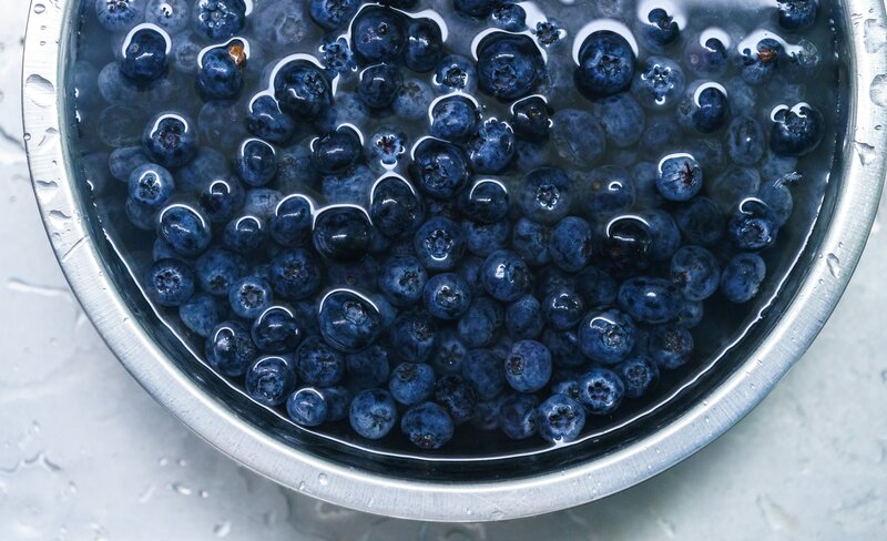 blueberries in a metal bowl