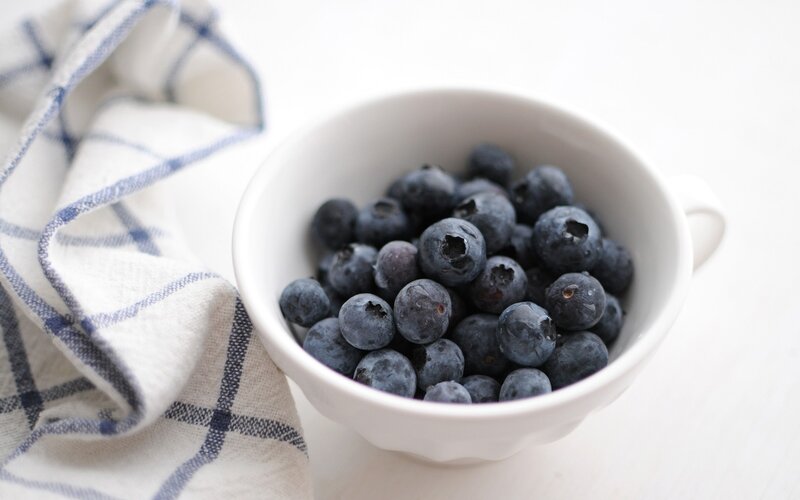 Blueberries in a white bowl