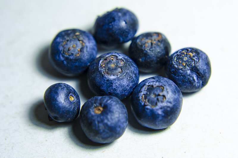 Blueberries on White Surface — Blue