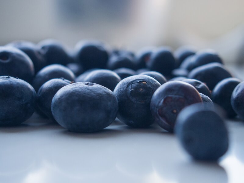 Blueberries on White Surface