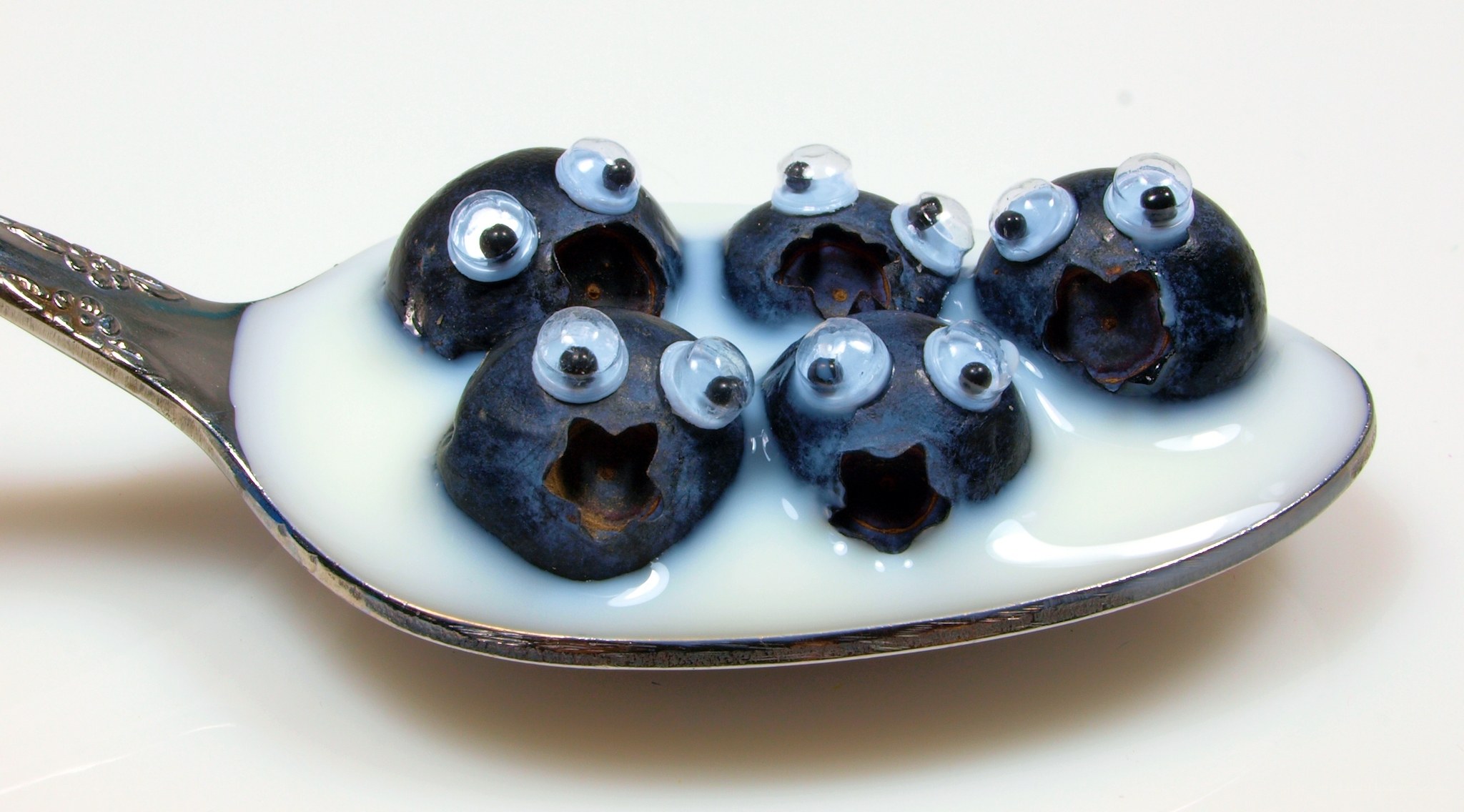 blueberries with googly eyes