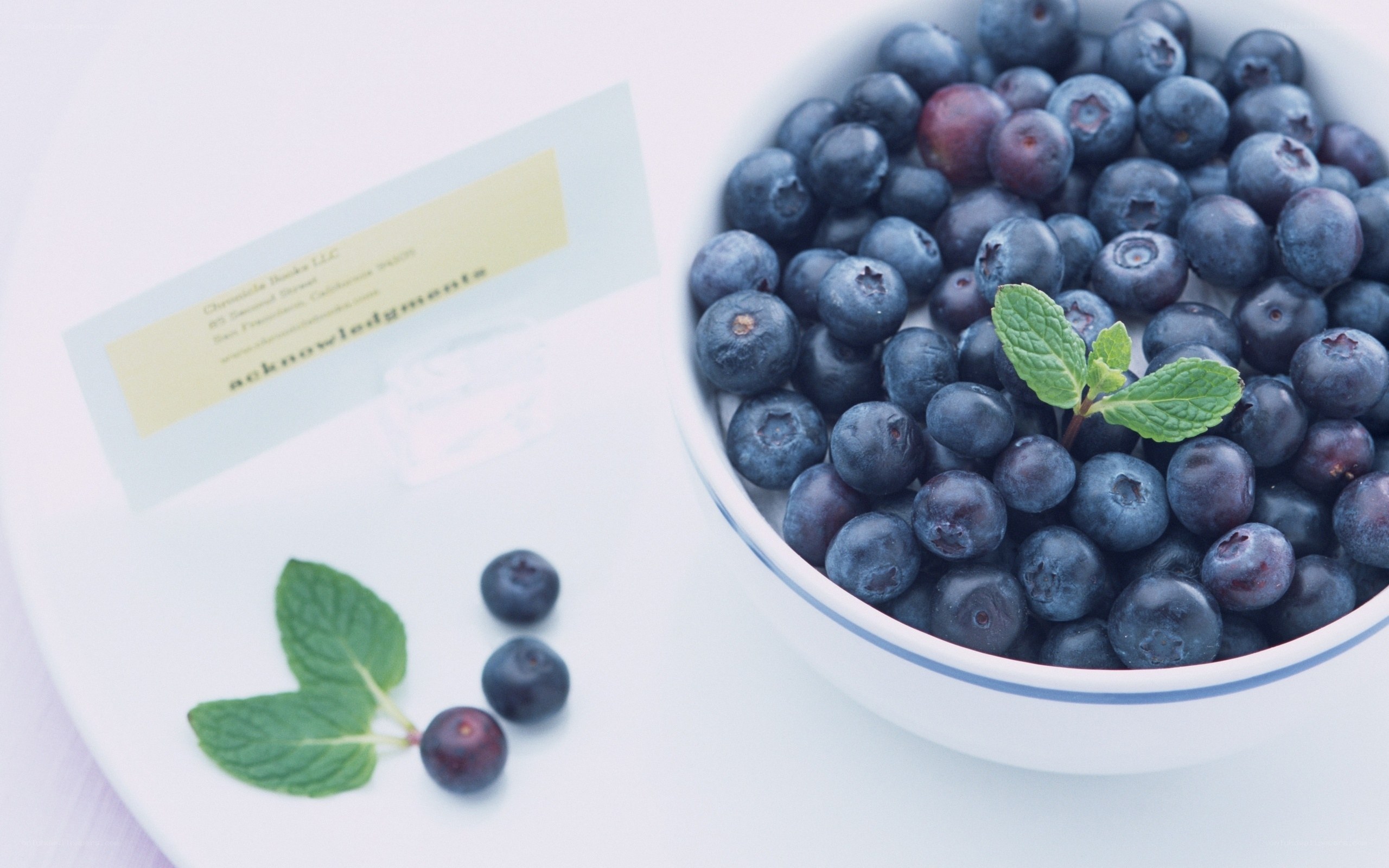 Blueberries with mint in a bowl