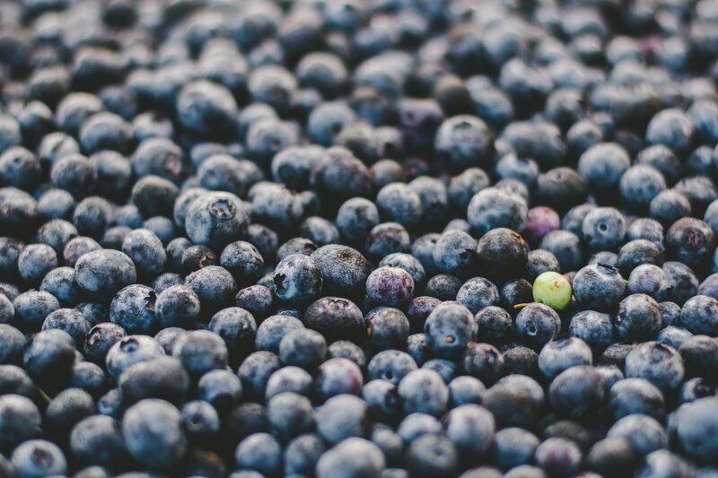 Blueberries with One Green