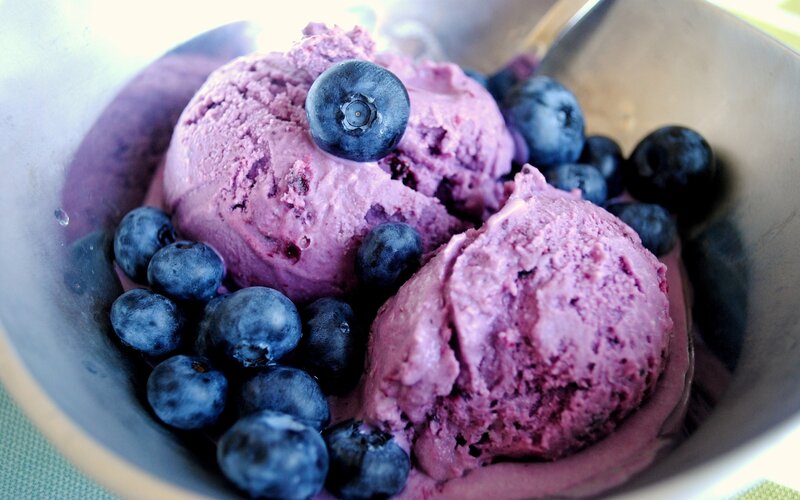 Blueberry ice cream with fresh berries