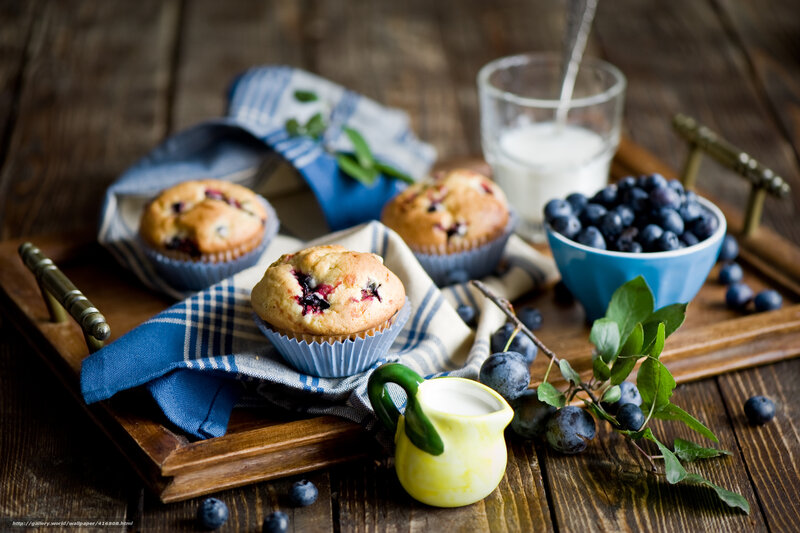 Blueberry muffins on a wooden tray