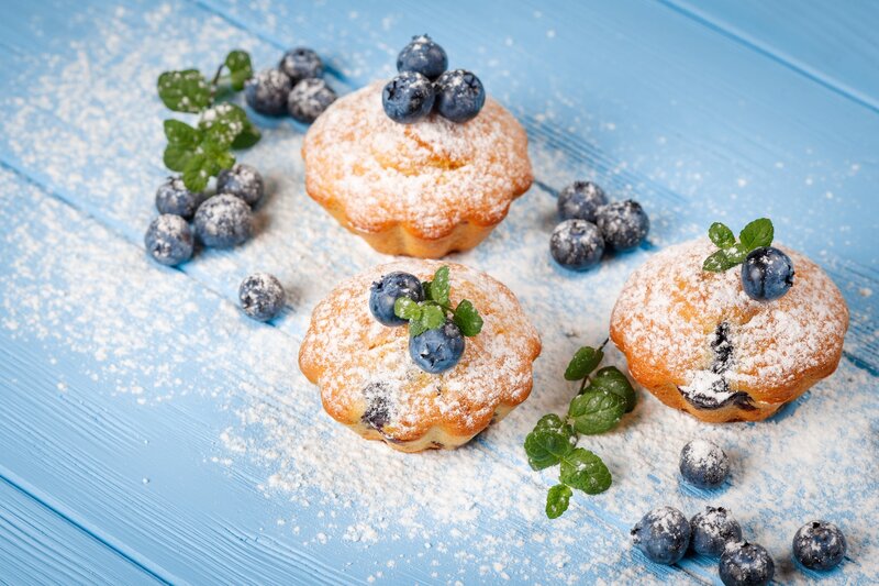 Blueberry Muffins on Table — Blue
