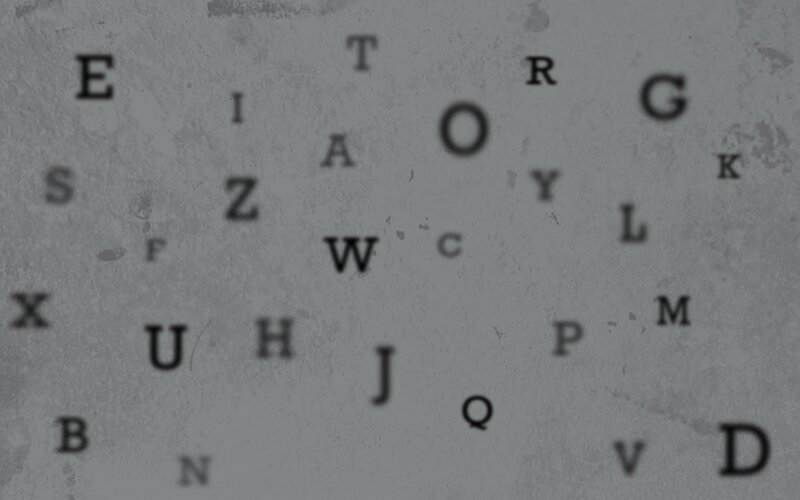 blurred alphabet letters