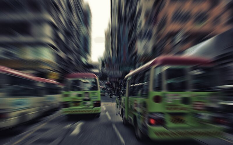 Blurred city bus scene
