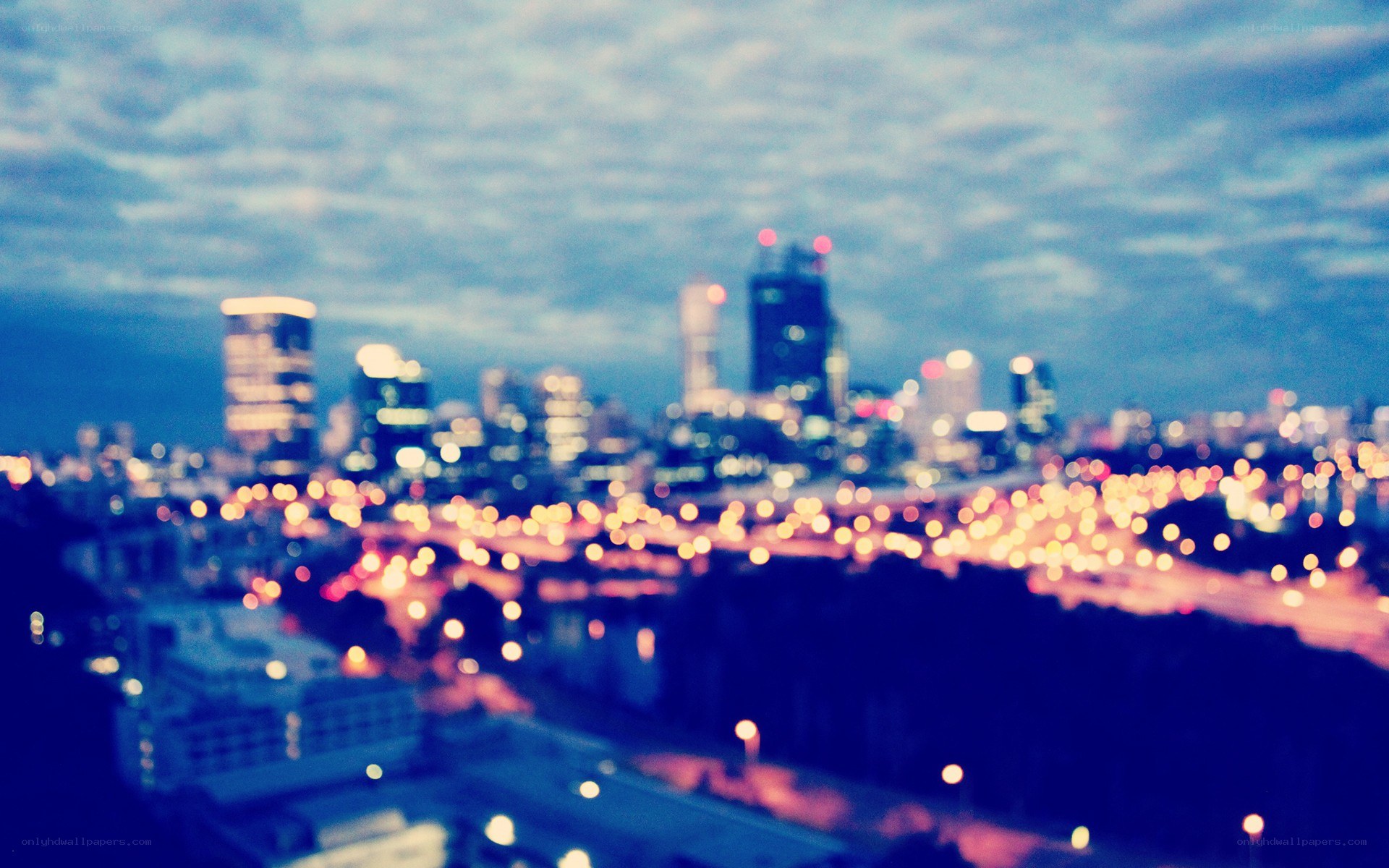 blurred city lights at dusk