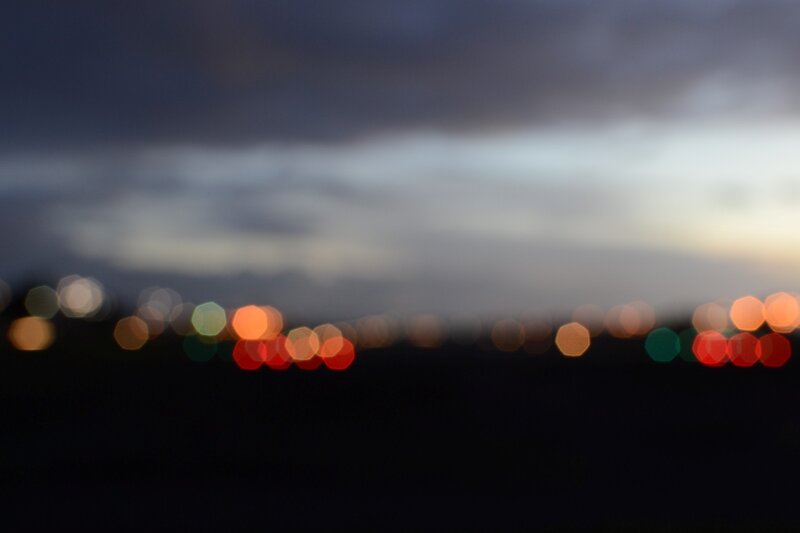 blurred city lights at dusk