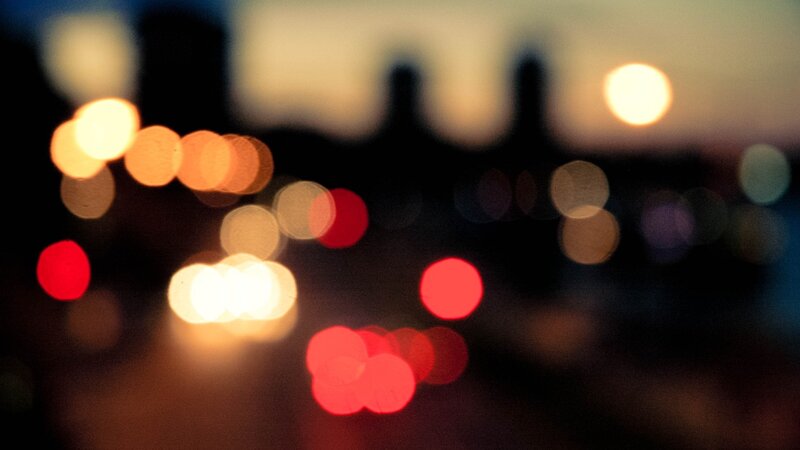 Blurred City Lights at Night — Red