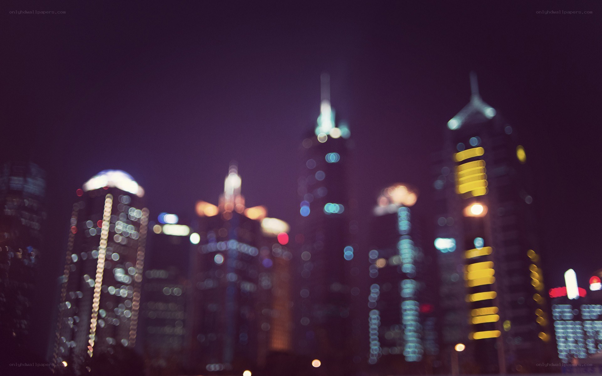 blurred city skyline at night