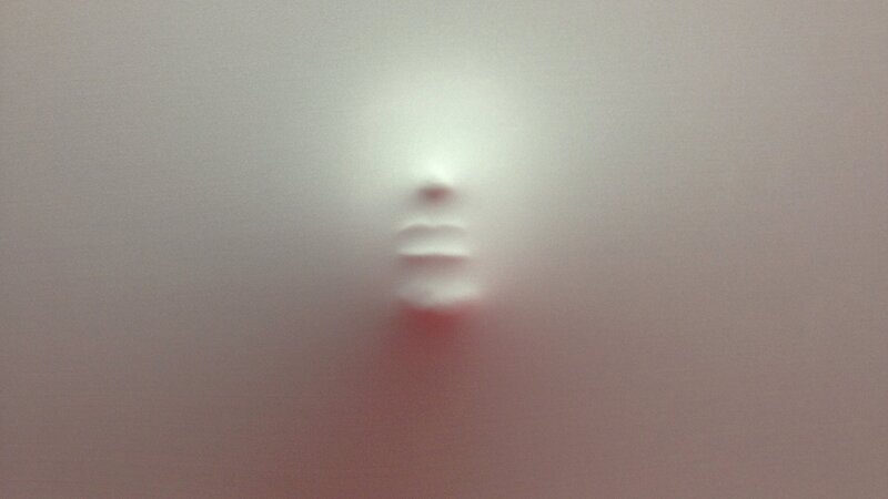 Blurred Face on Glass