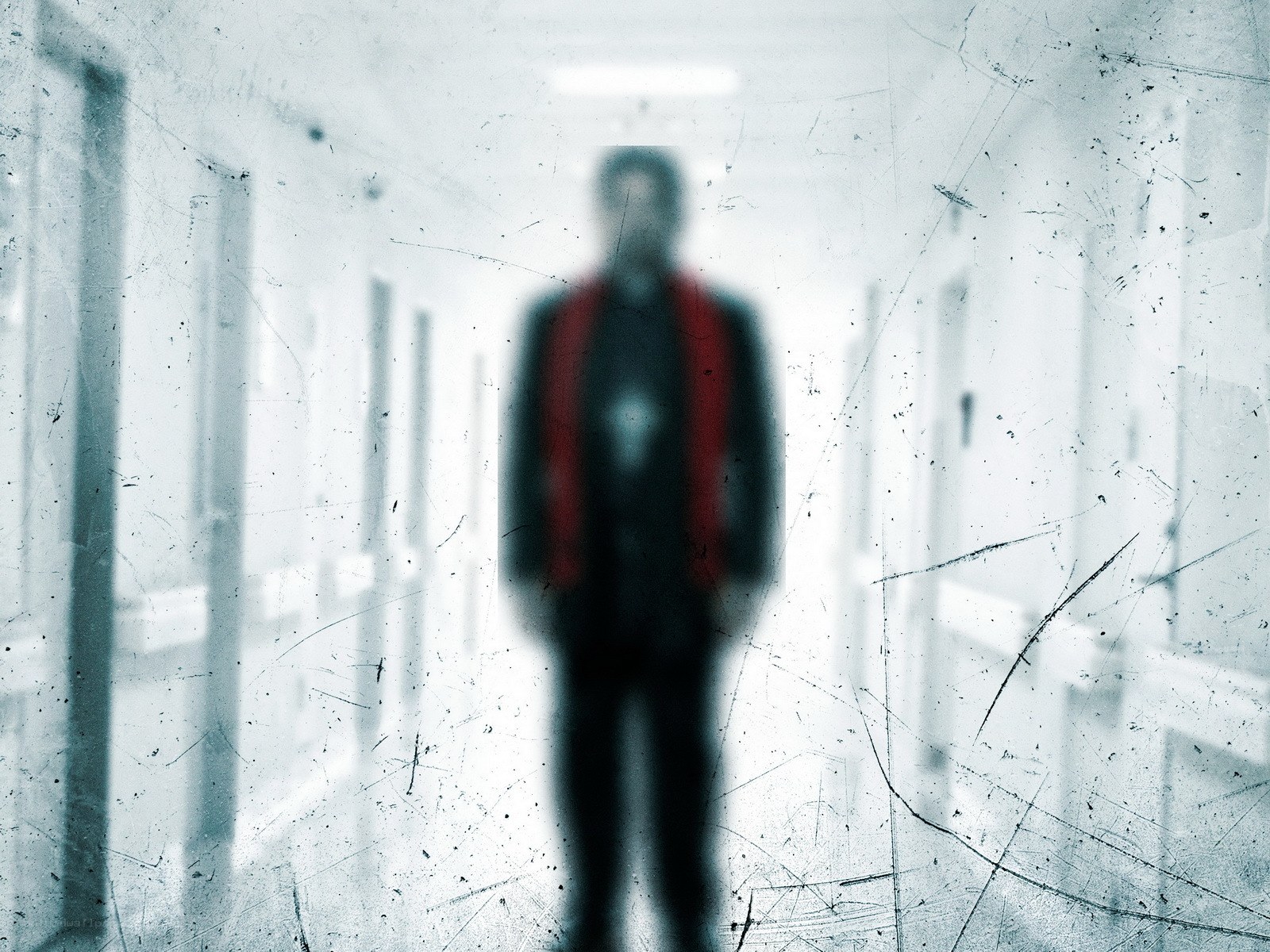 Blurred figure in a hallway