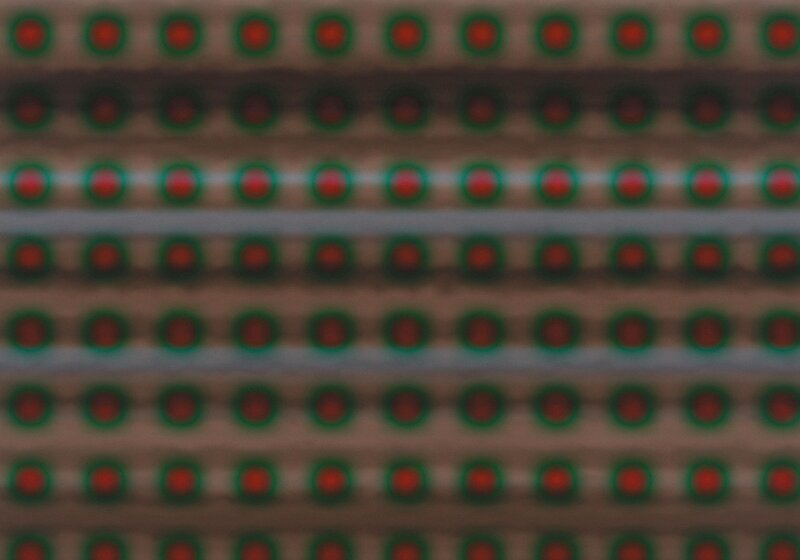 blurred grid of red and green lights