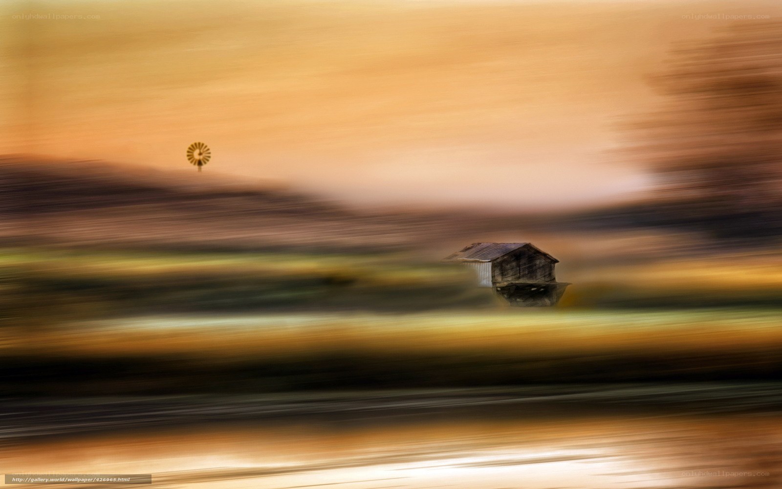 Blurred landscape with cabin