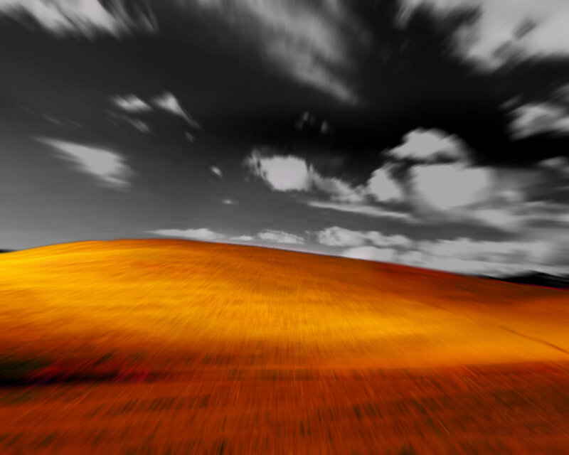 Blurred landscape with dramatic sky