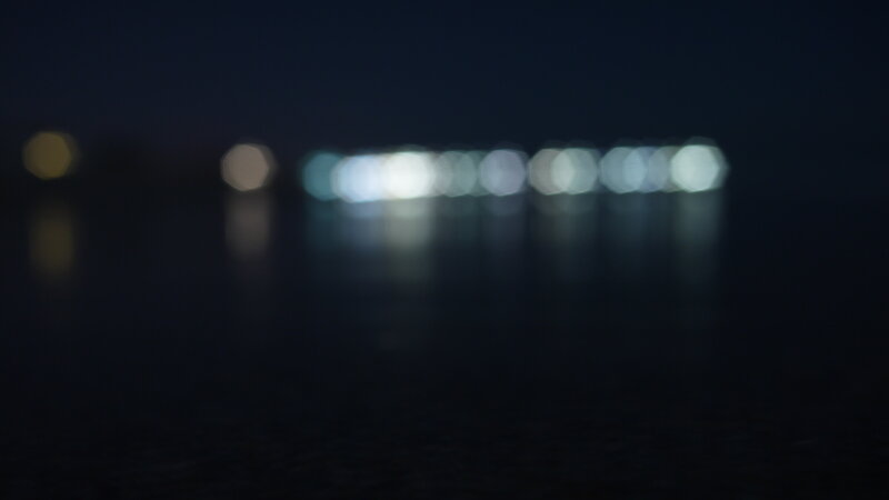 blurred lights on water at night