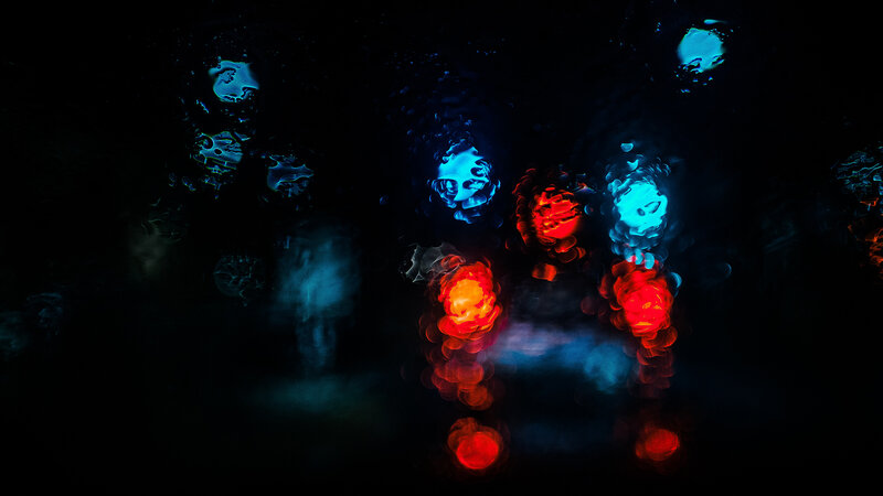Blurred Lights on Wet Surface — Red