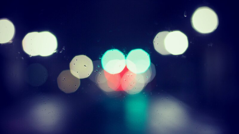 blurred lights through rain
