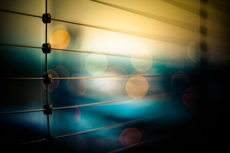 Blurred Lights Through Wires