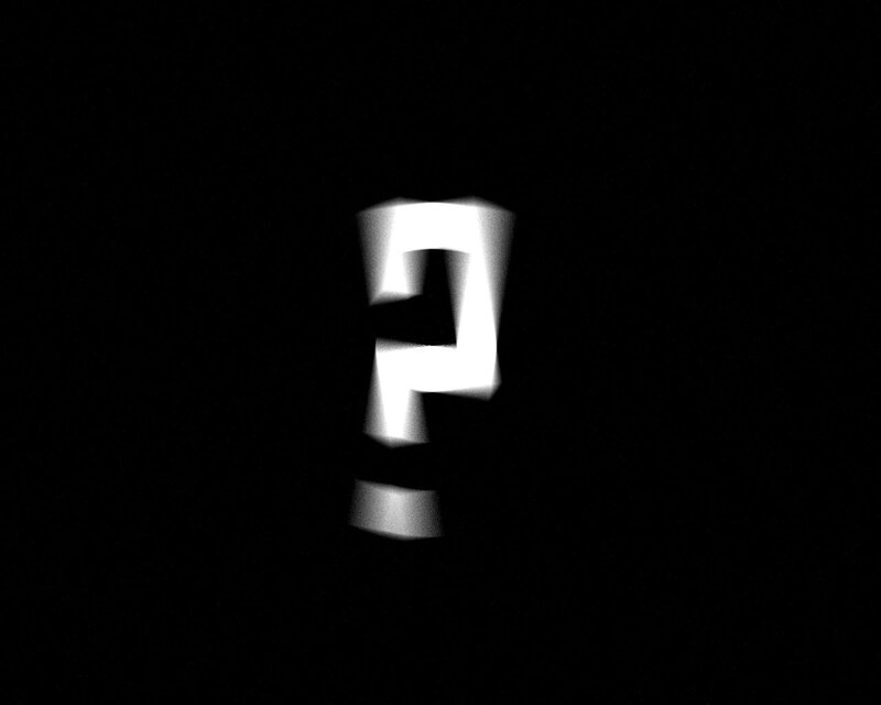 blurred question mark symbol