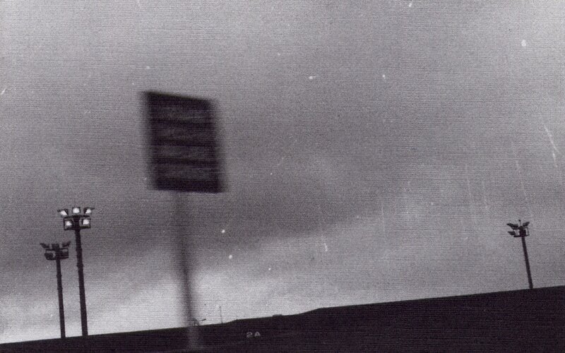 Blurred Sign and Lights — Black