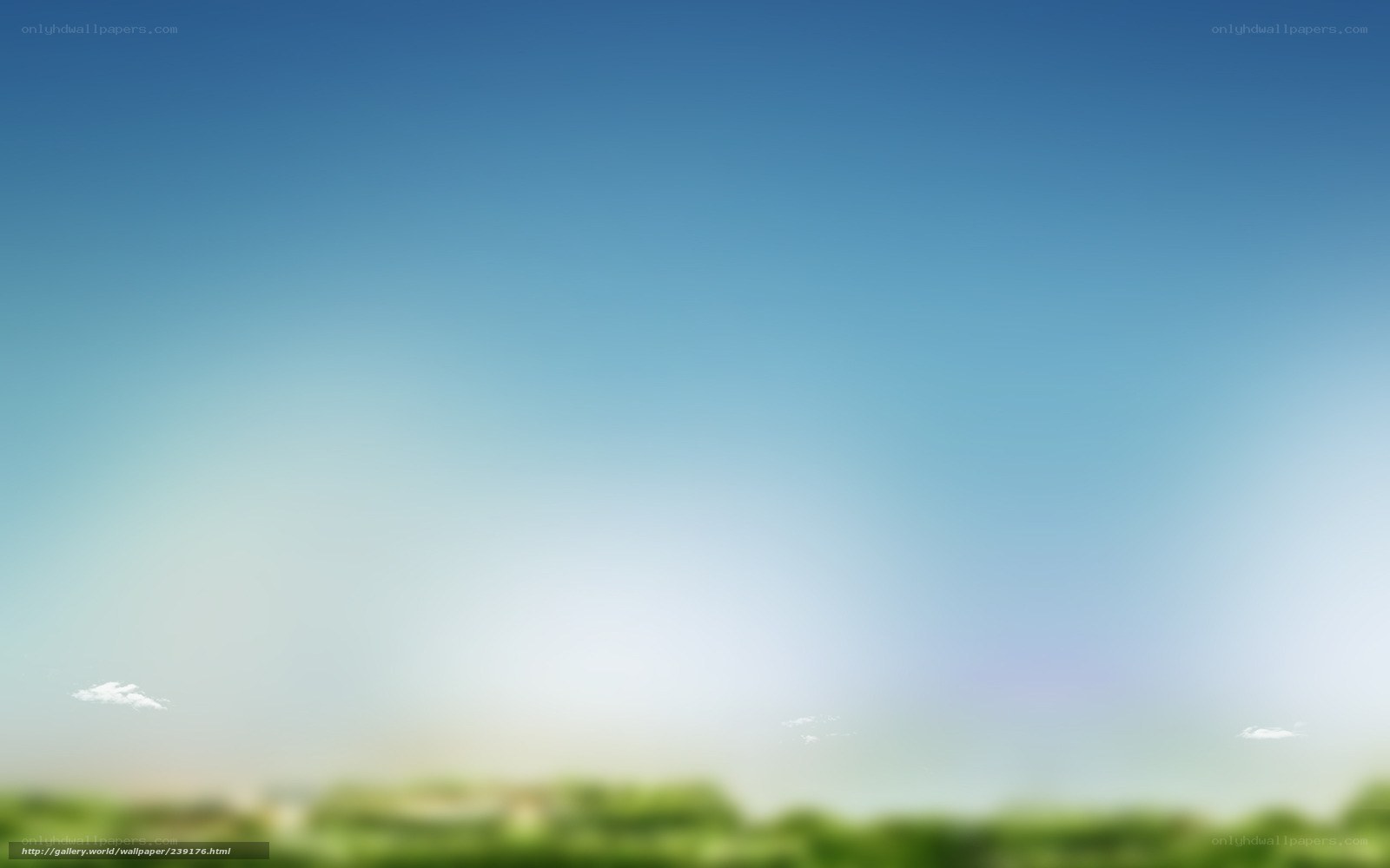 Blurred sky and green landscape