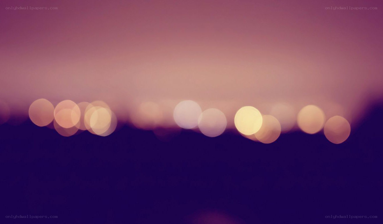 blurry city lights at dusk