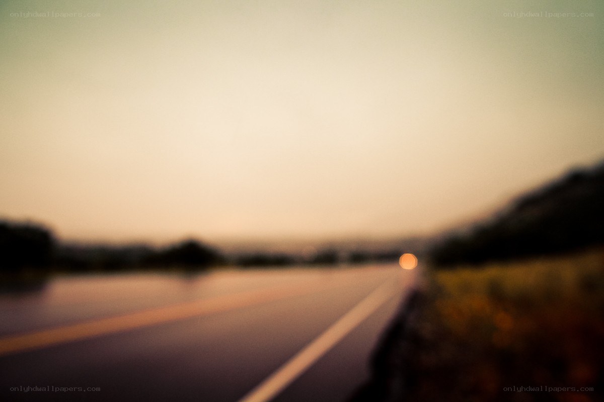 blurry road at dusk