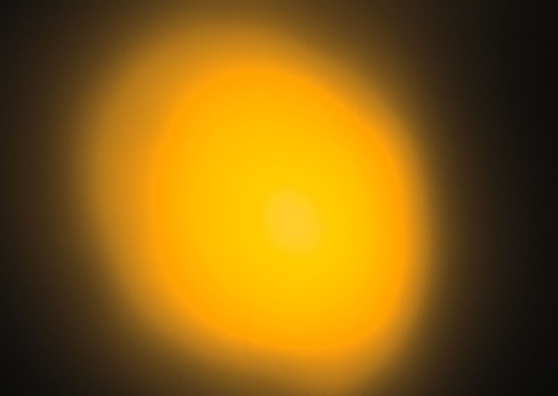 blurry yellow light source